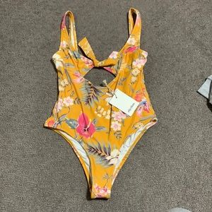 BRAND NEW WITH TAGS!! rhythm one pice floral swimming suit!!